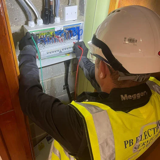 PB Electrical Services engineer testing a consumer unit
